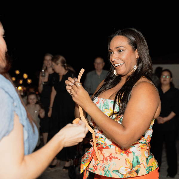 woman smiling- receiving prize-raffle