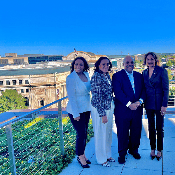 businessprofessionals-smiling-on-balcony