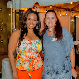 two-women-smiling-holiday-party-fundraiser-broward-county